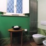 Boiserie  e zoccolatura in Marmo Verde Giada spazzolato Montecchi marmi e graniti Modena